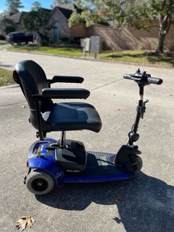 Pride Mobility Go-Go Motorized Wheelchair