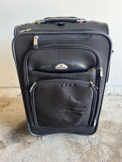 Carry on size luggage $15