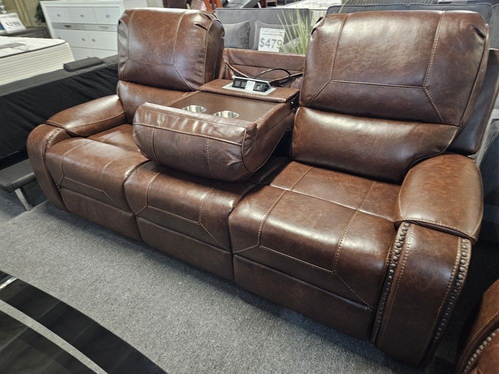 Brand New Brown Synthetic Leather Manual Reclining Sofa With Cup Holders And Charging Ports (87 x 40 x 42 in. H)