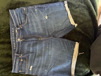Men’s blue denim shorts brand is American Eagle size 36