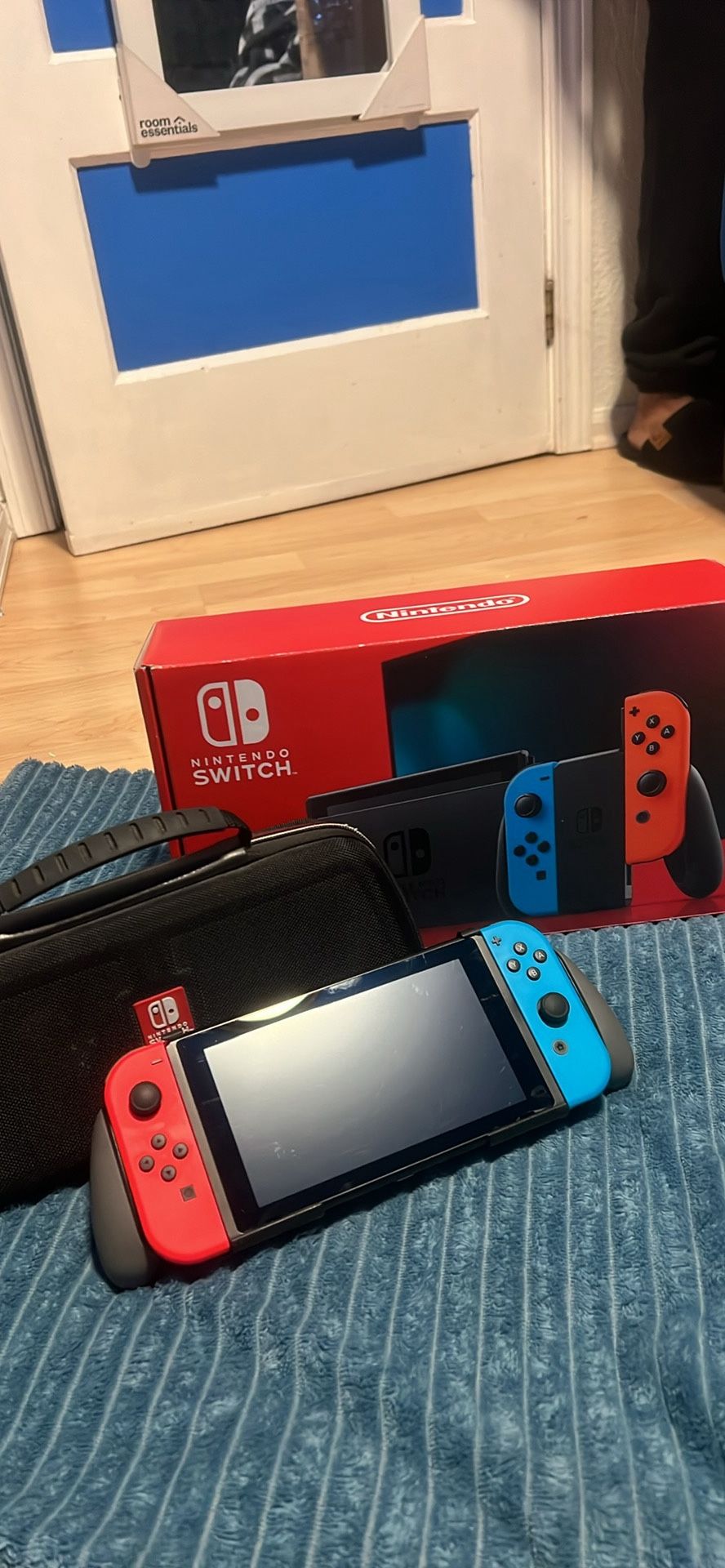 NINTENDO SWITCH IN BOX WITH DOCKING STATION, CASE, MEMORY CARD AN MARIO KART 8. NO TRADES CASH ONLY 