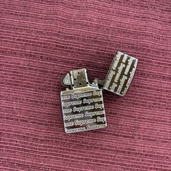 Supreme Repeat Engraved Zippo