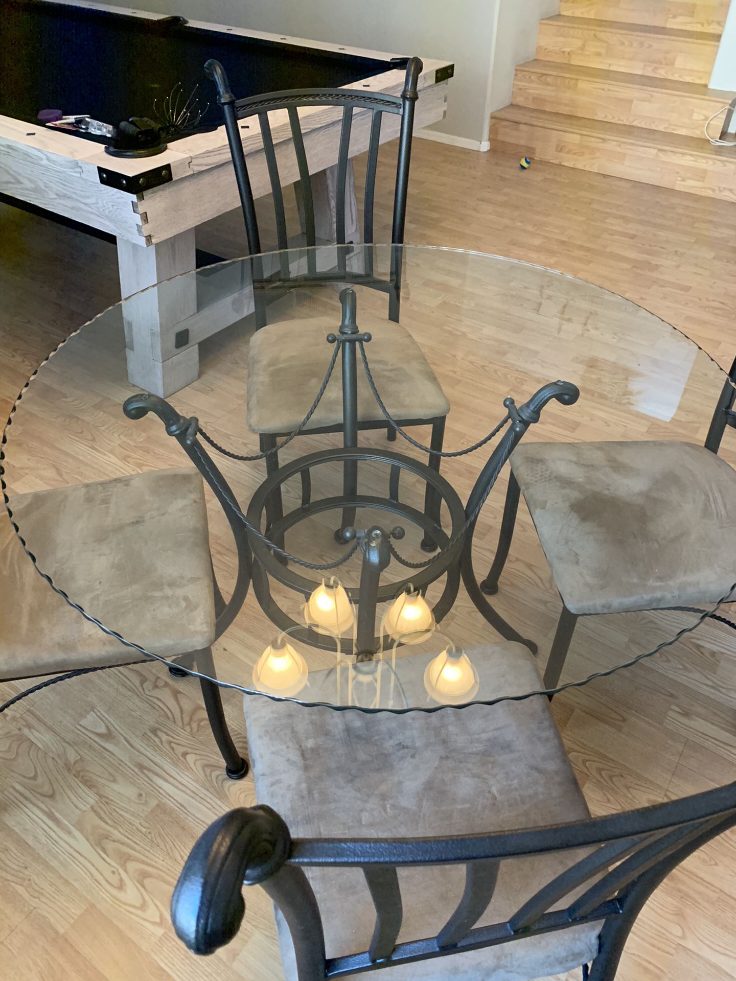 Round glass table with chairs