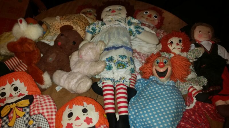 One dozen vintage dolls, with Raggedy Anne, Bozo, more