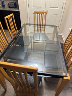 Dinner or kitchen table with 6 chairs glass and wood