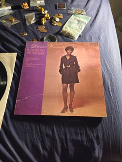 vintage vinyl LP of I'll Never Fall in Love Again by Dionne Warwick, released on Scepter Records (catalog number SPS-581) in 1970.
