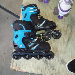 Little boy skates size M
