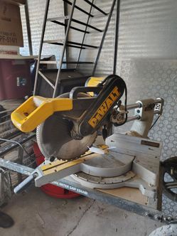 DeWalt 12-inch sliding compound miter saw with Delta rolling stand.

Good working condition. Includes everything shown in the pictures.

$550 or best 