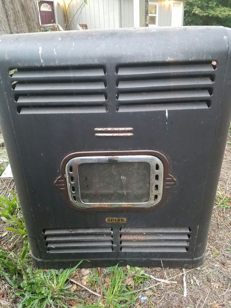 Two Antique Spark Oil burning stoves