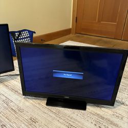 One Dell Monitor & 2 Small TV’s