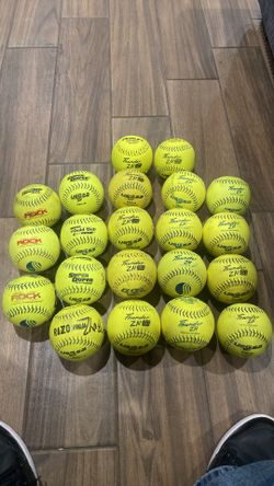 21 slow pitch softballs 12’