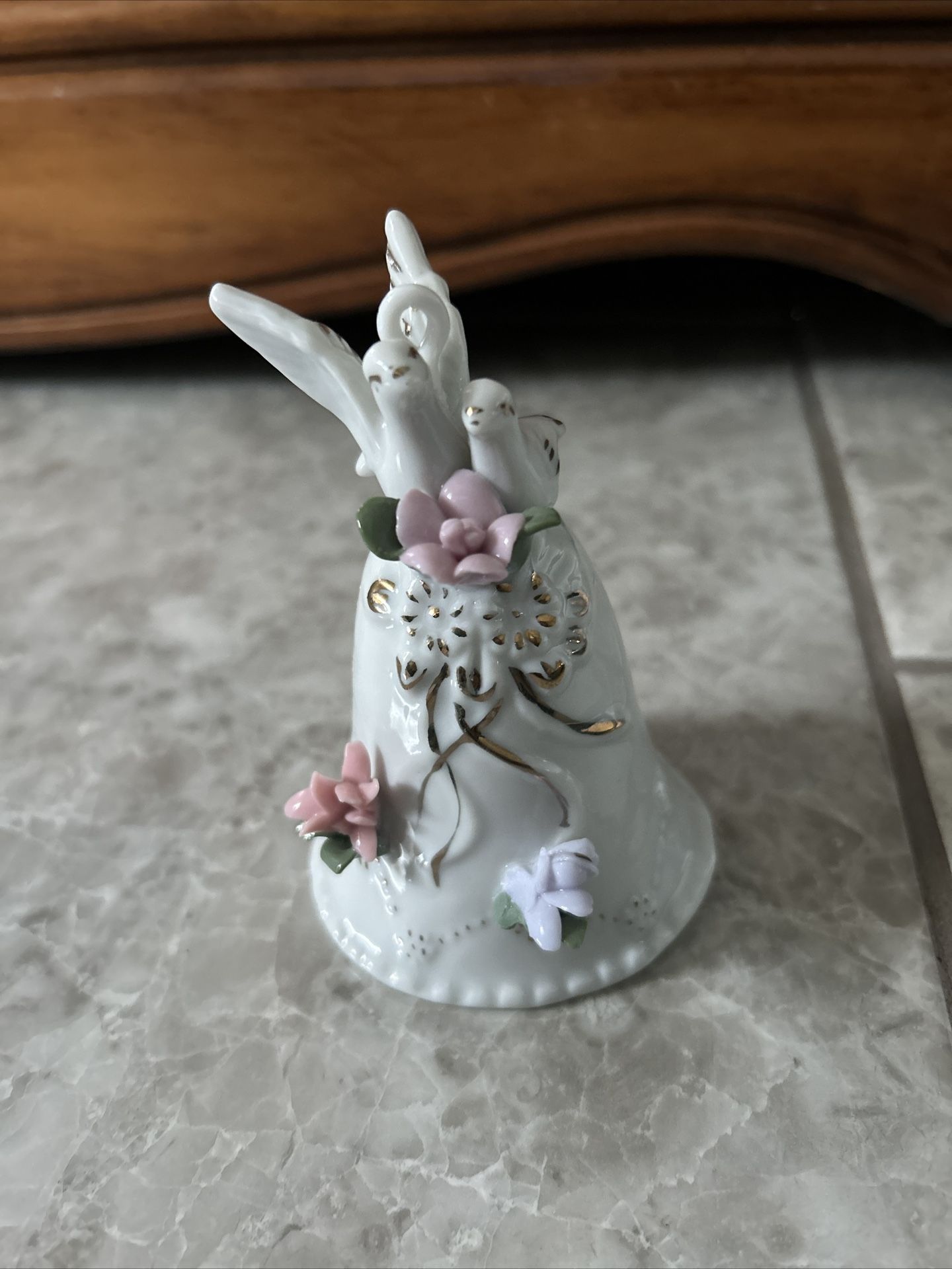 White Ceramic Wedding Bell Trimmed in Gold With Applied Flowers And Two Doves