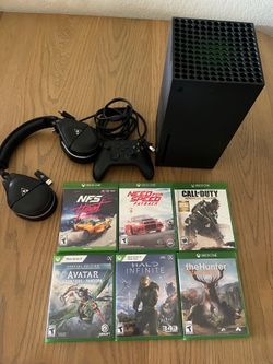 Xbox One X console with wireless headset and games