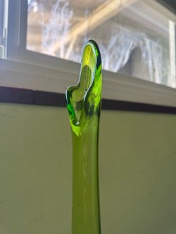 vintage mid-century green glass “swung” pedestal vase