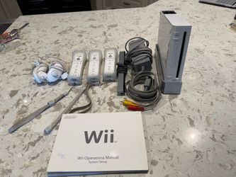 Nintendo Wii  with 4 games included