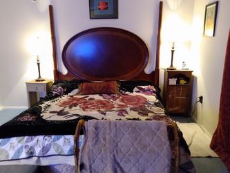 Matching lamps compliments headboard