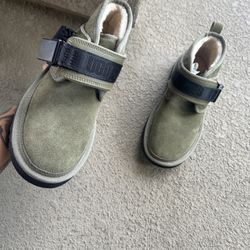 Green suede UGG boots with straps
