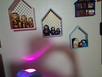 Set up three wall shelves