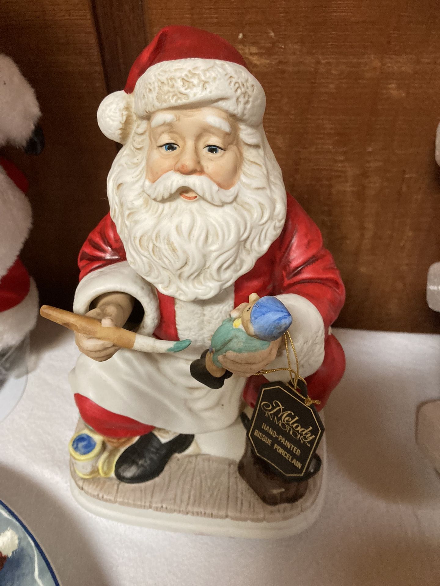 Vintage moving Santa music box and titled melody in motion hand-painted bisque porcelain mint condition