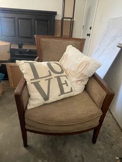 Wood-frame club chair, tan upholstery — $85 OBO
