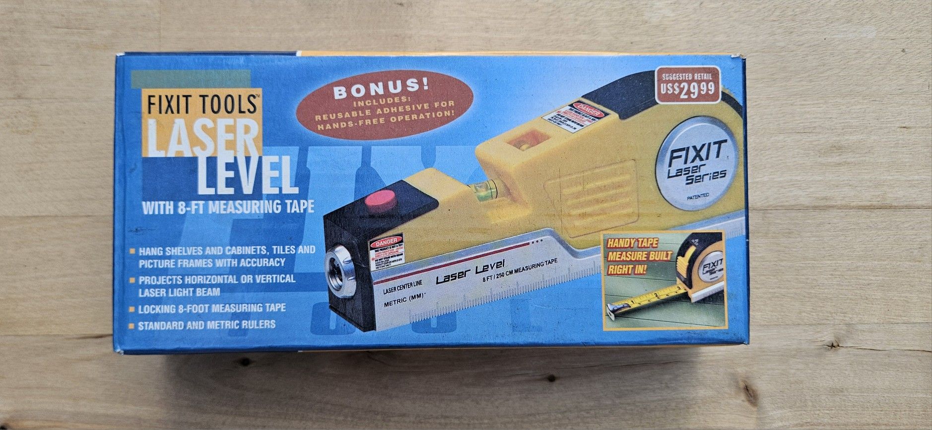 NIB, Fixit Tools Laser Level with 8-ft Measuring Tape.