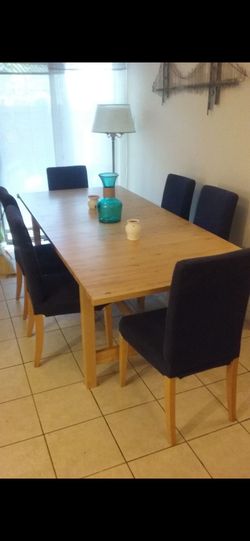 Solid Wood Table & 6 Chairs $280 Dlls.