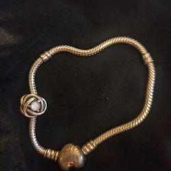 Extra Small Size Sterling Silver Pandora Bracelet With Ornate Charm. 