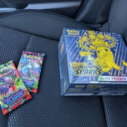 Sealed Pokemon ETB Surging Sparks + 2 Bonus Packs