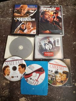 5 pictures  22 assorted dvds $1 each  Or All $10