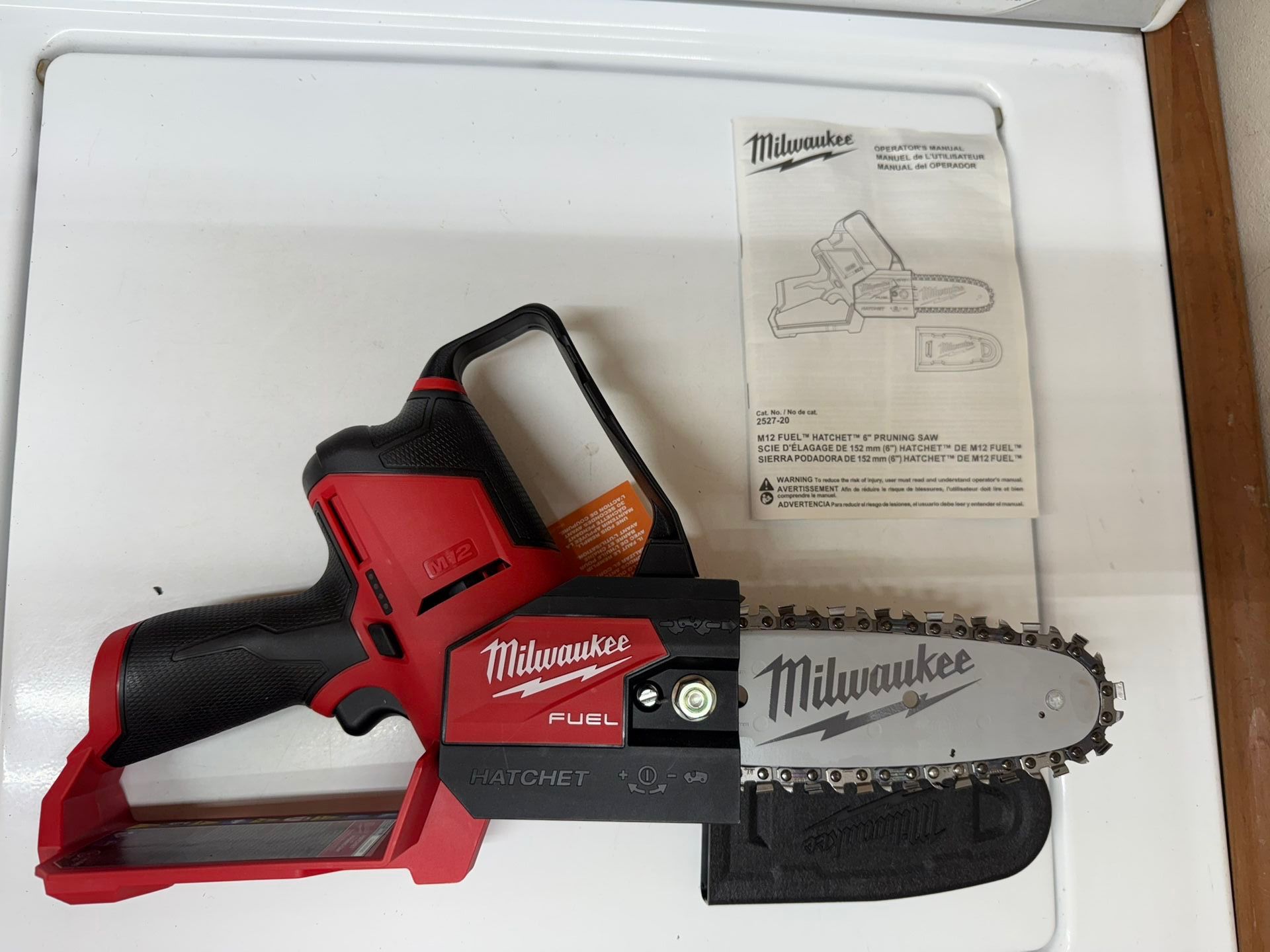 Brand New Milwaukee M 12 Chainsaw (TOOL ONLY). (CASH ONLY).