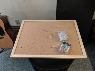 Cork bulletin board with push pins