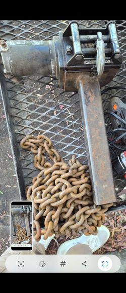 Trailer Hitch Electric Winch on your motorhome using a standard 2-inch by 2-inch hitch receiver and a compatible hitch-mounted winch plate.