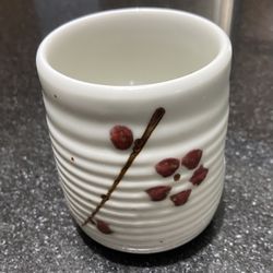 Vintage Japan Handleless Pottery Tea Cup With Flower (1980’s). Signed