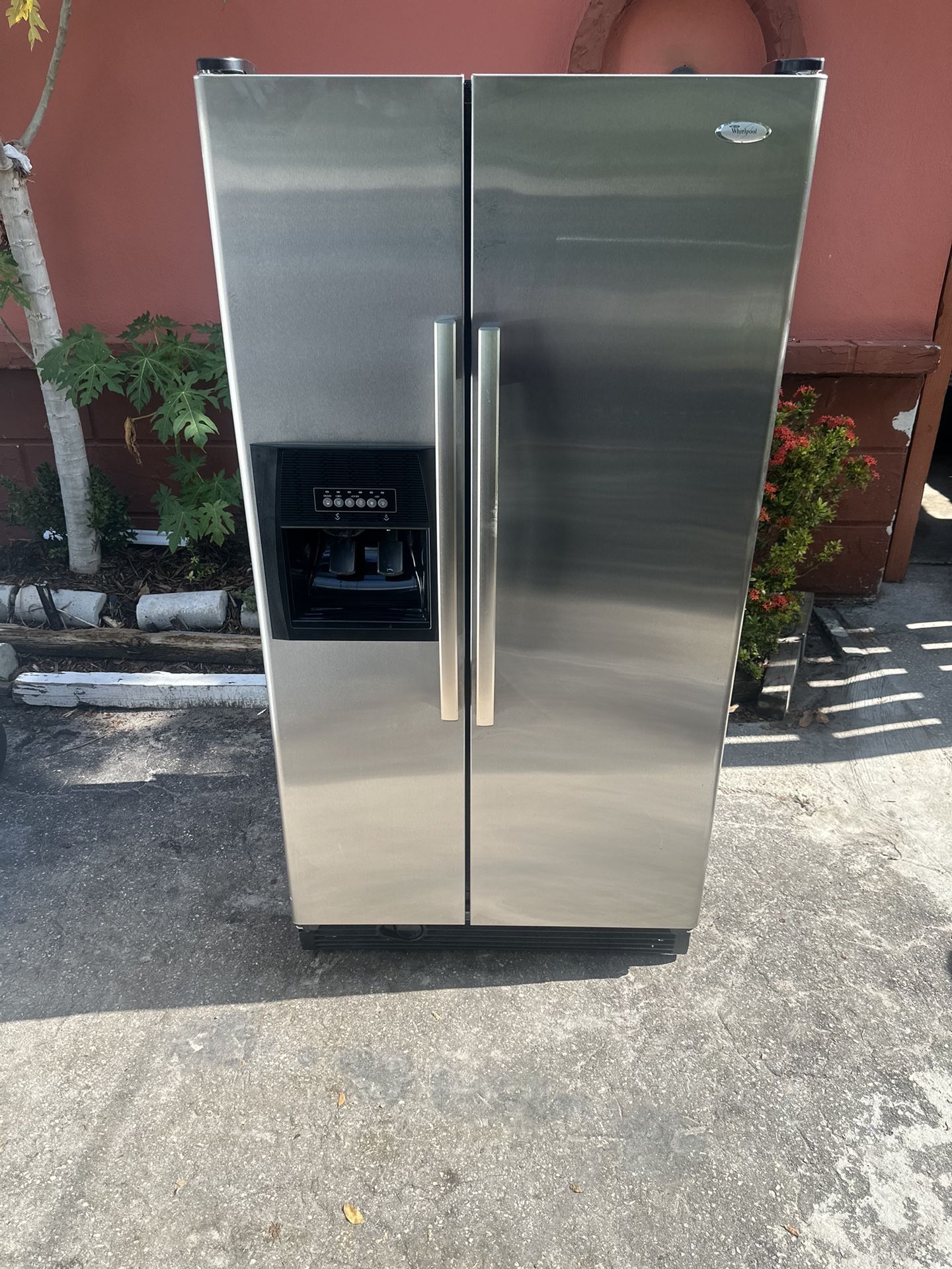 Whirlpool Stainless Steel Refrigerator; Side by Side