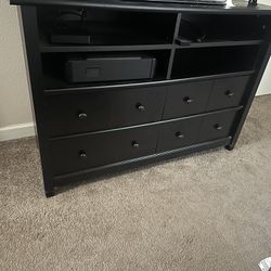 Black Media dresser chest with 4 shelves/compartments and 4 drawers