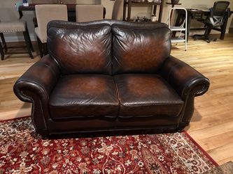 Brown leather sofa and loveseat. Must pick up from 92103