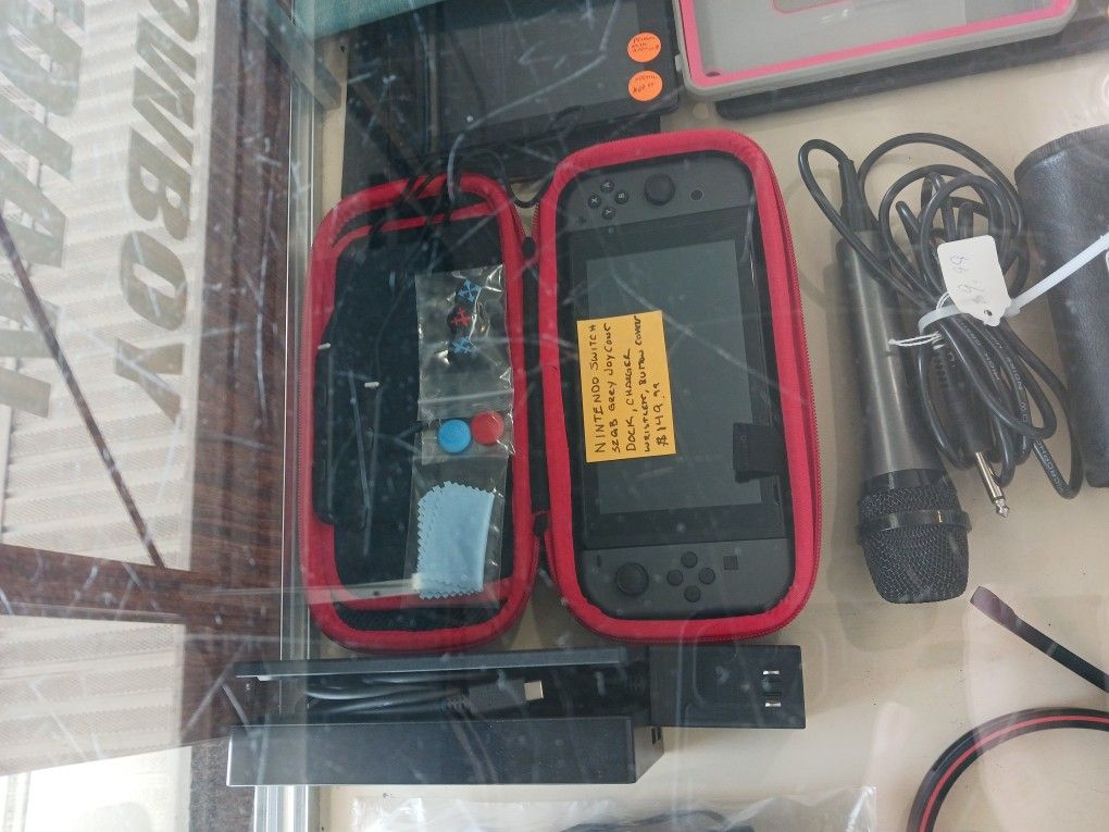 Nintendo Switch 32gb Grey JoyCons Dock, Charger, Wristlet, Button Covers And Case