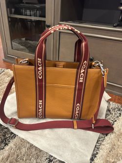 Coach shoulder bag with strap included