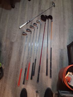 Golf clubs + caddy