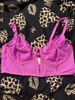 hot pink “corset” like crop top