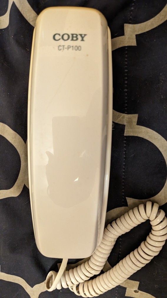 Colby CT-P100 Trimline Landline Desk Or Wall Phone. Redial, Mute, Flash, High/Lo Volume, Ringer On/Off. Top Sun Faded