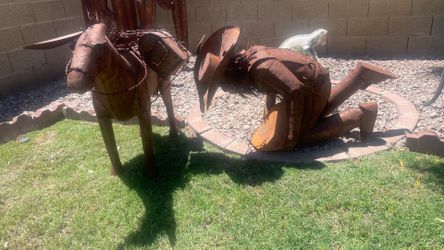 Miner with a Donkey and a Camel