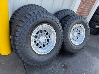 NEW 17x9 ARENA wheels wrapped in 35x12.50r17 atturo A/T tires