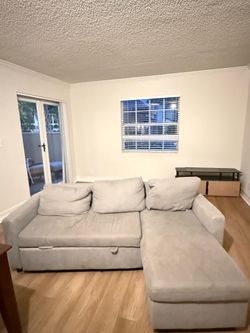 L-Shaped Light Gray Sectional Sofa