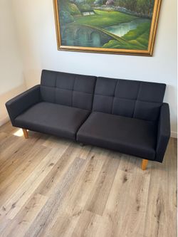 New / Lightly Used Black Fabric Tufted Futon Sofa