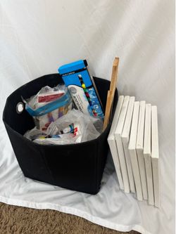 Painting bundle with paint, paint brushes, mini easel and 7 canvases