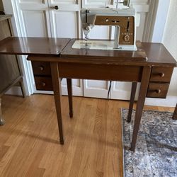 Singer Sewing Machine In Cabinet