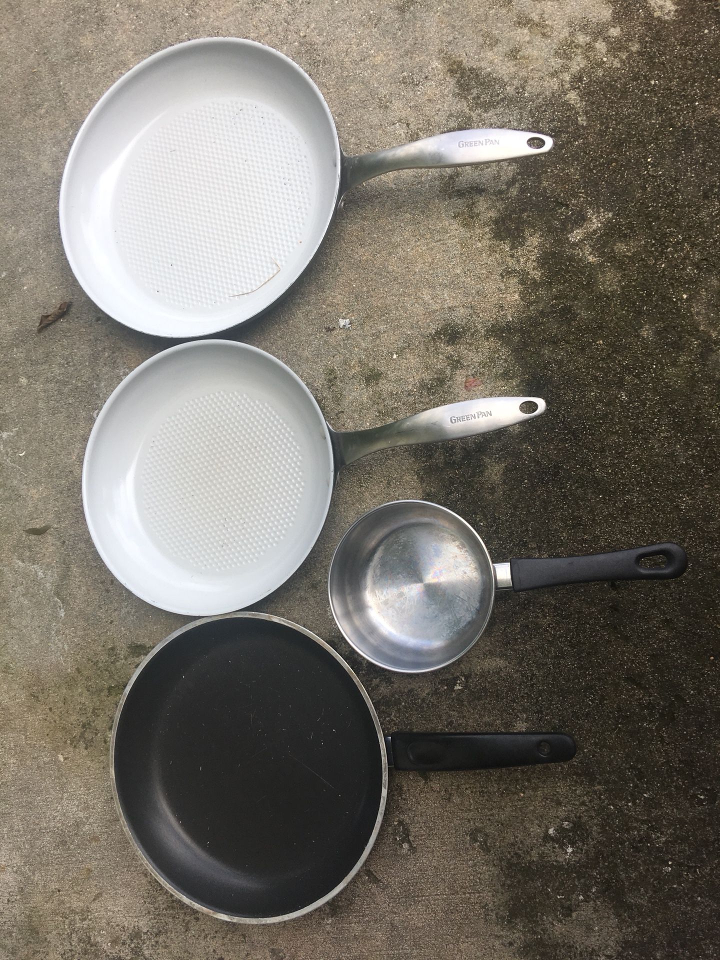 LOT of great sturdy pans and a small pot