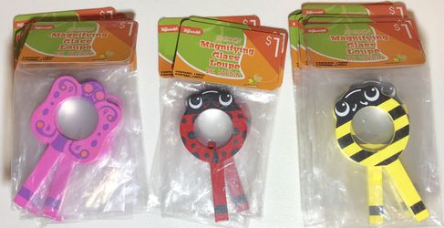 Magnifying Glass, by Toysmith - Child’s Garden Magnifying Glass, 10 Bee, 9 Butterfly, and 3 Ladybug themed items, plus 3 Floral Headbands (included).