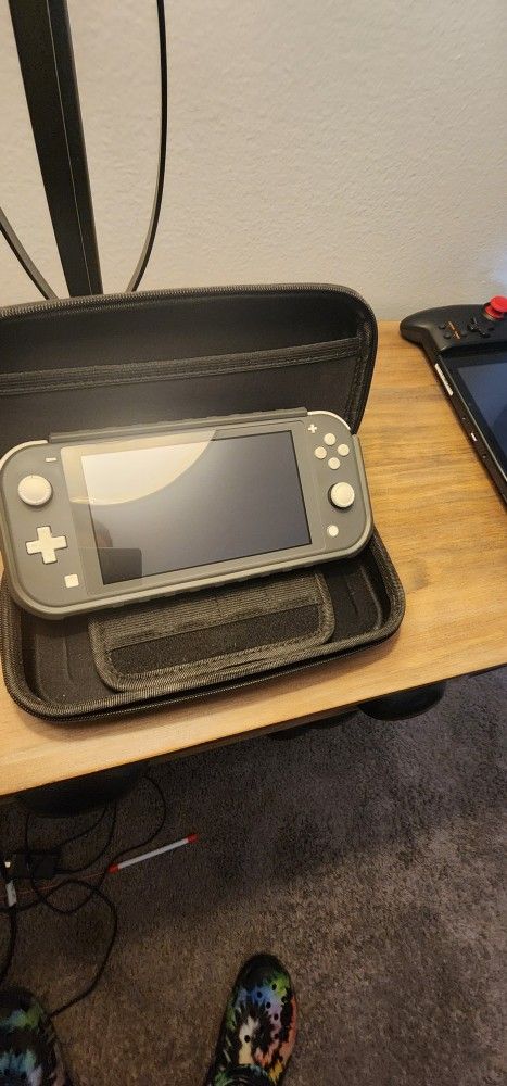 Nintendo switchlite grey with Nintendo zelda 64gb memory grip case , and case